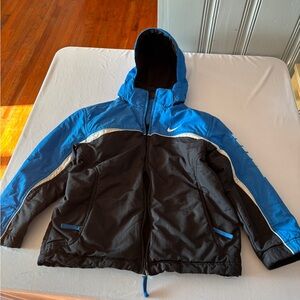 Nike Kids Puffer Reversable jacket in Blue and Black with White Accents
